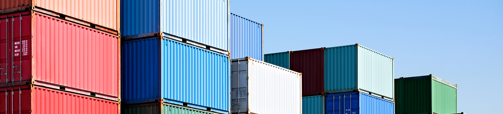 Cargo freight containers at harbor terminal stock